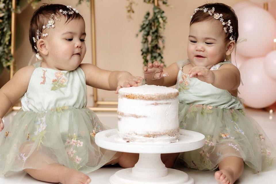 <p><a href="https://www.instagram.com/brandeebestphotography/">@brandeebestphotography</a></p> Ella and Eliza Fuller, formerly conjoined twins who were surgically separated on June 14, 2023, celebrate their first birthday
