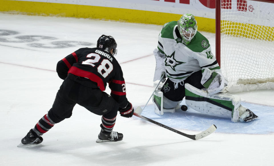 Ottawa Senators right wing Claude Giroux is stopped by Dallas Stars goaltender Scott Wedgewood during the second period of an NHL hockey game, Thursday, Feb. 22, 2024 in Ottawa, Ontario. (Adrian Wyld/The Canadian Press via AP)