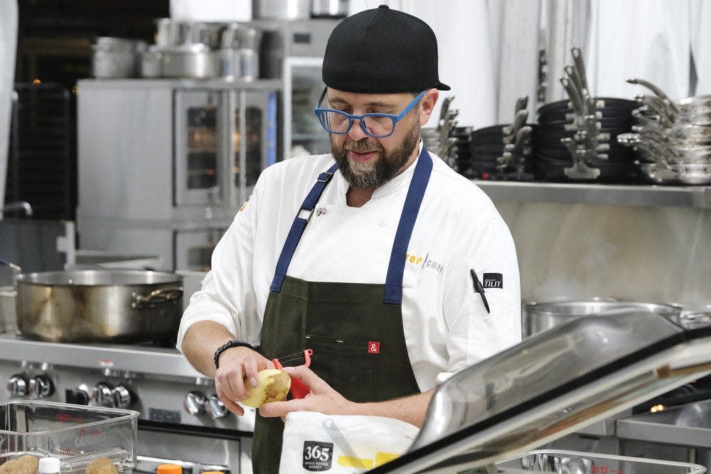 Milwaukee chef Dan Jacobs prepares a smoked walleye dish with labneh and hash brown potato cake for Channel's first course during the Restaurant Wars episode of "Top Chef: Wisconsin."
