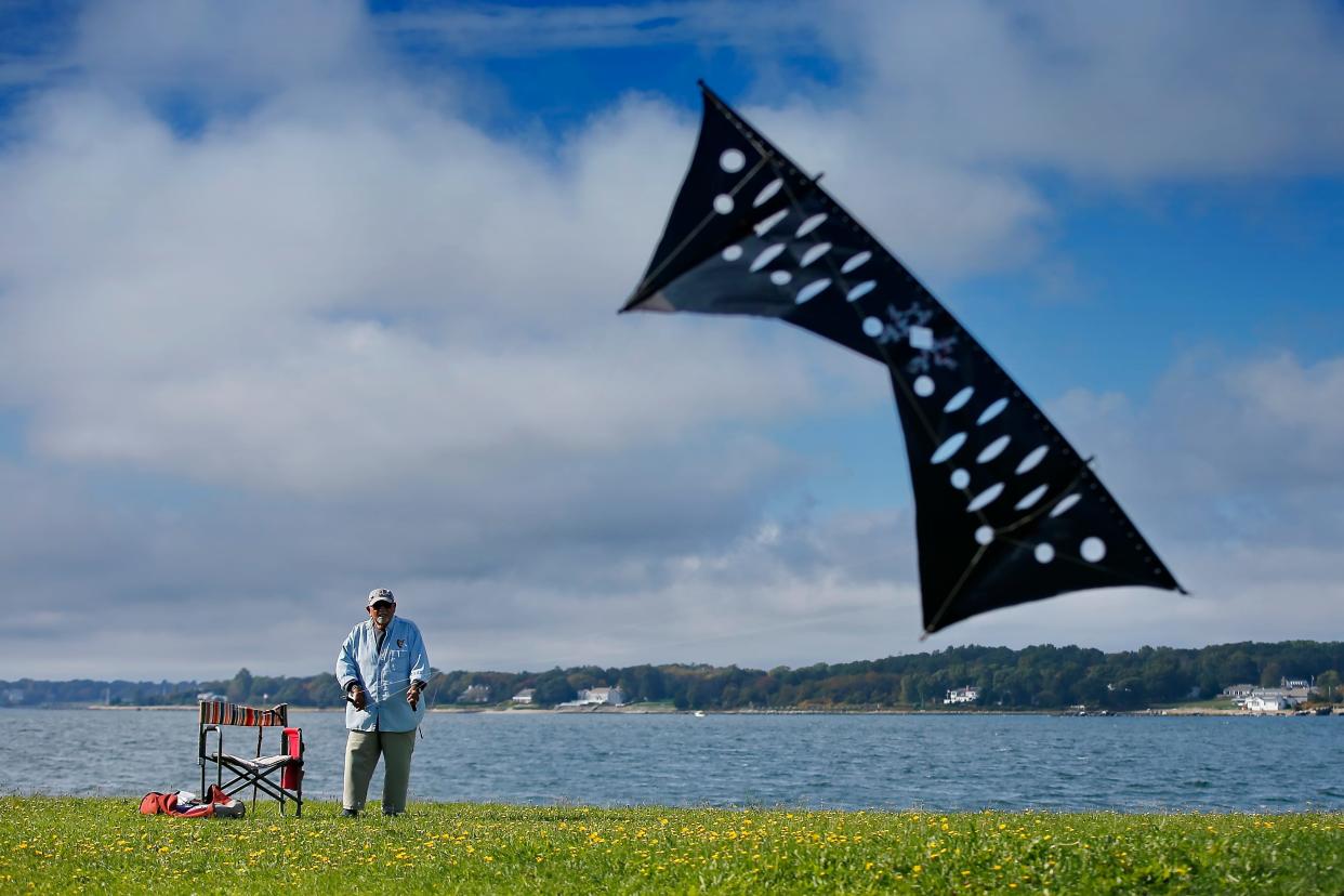 Arthur St. Pierre flies his acrobatic kite on West Beach in New Bedford.