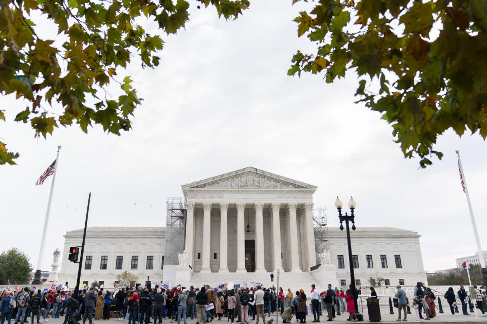 Gun safety and domestic violence prevention organizations gather outside of the Supreme Court before oral arguments are heard in United States v. Rahimi, Tuesday, Nov. 7, 2023, in Washington. (AP Photo/Stephanie Scarbrough)