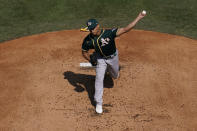 Oakland Athletics' Jesus Luzardo pitches against the Houston Astros during the first inning of Game 3 of a baseball American League Division Series in Los Angeles, Wednesday, Oct. 7, 2020. (AP Photo/Marcio Jose Sanchez)