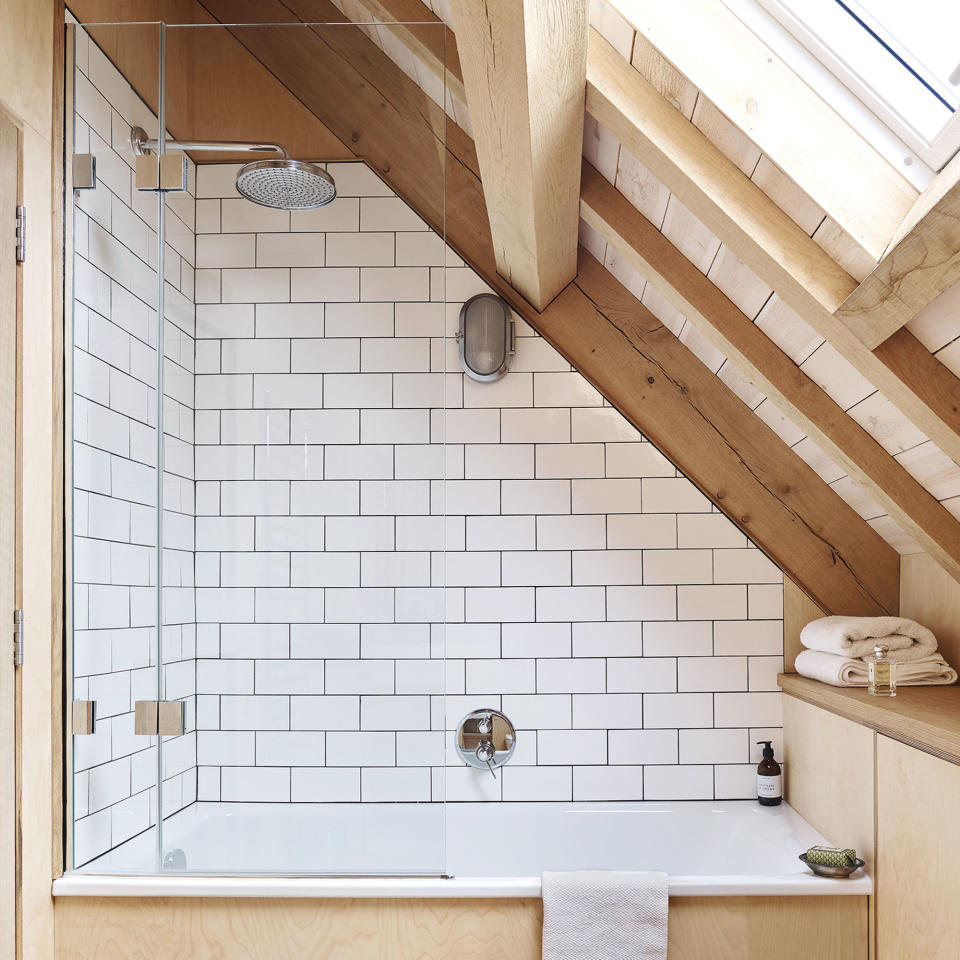 bathroom with tiles and shower