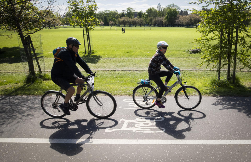 Cyclists exercise in The Meadows in Edinburgh as the UK continues in lockdown to help curb the spread of the coronavirus.