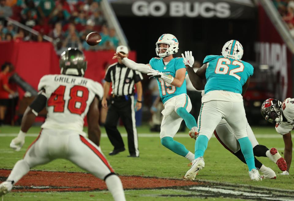 Dolphins backup quarterback Skylar Thompson passes against Tampa Bay.