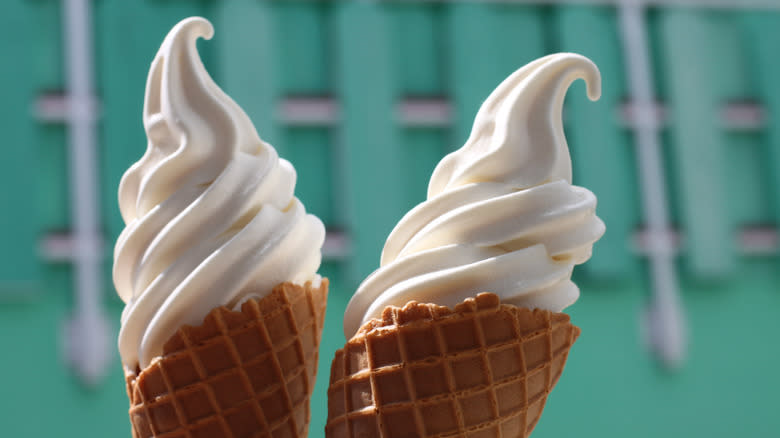 pair of vanilla soft serve cones