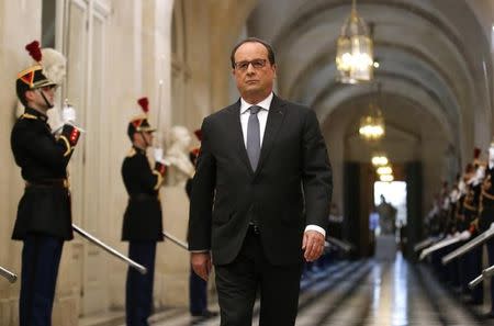 French President Francois Hollande arrives to deliver a speech at a special congress of the joint upper and lower houses of parliament (National Assembly and Senate) at the Palace of Versailles, near Paris, France, November 16, 2015, following the series of deadly attacks on Friday in the French capital. REUTERS/Michel Euler/Pool