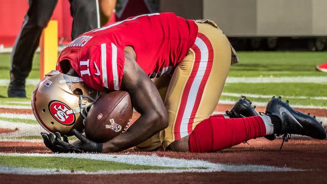 Goodwin hunches over as the emotion overwhelms him. Pic: Getty