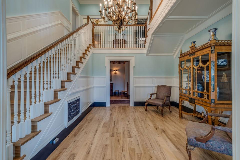 The home is full of antique and custom-made hardware and tongue and groove ash floors.