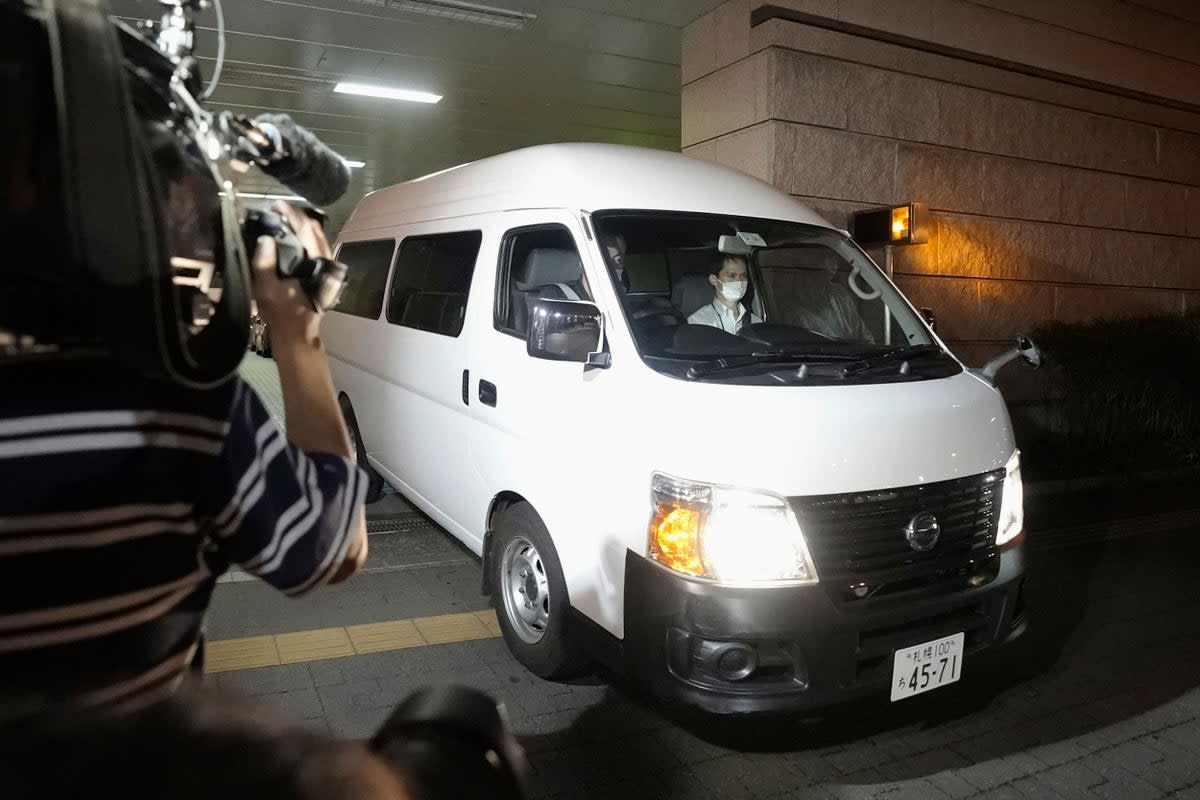 Runa Tamura, who was arrested in connection with the case that a headless man was found, is transferred from a police station in Sapporo (AP)