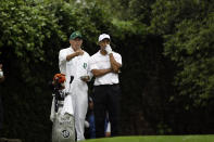 <p>Tiger Woods and his caddie Steve Williams discuss a shot during the third round of the 2008 Masters golf tournament at the Augusta National Golf Club in Augusta, Ga., Saturday, April 12, 2008. (AP Photo/David J. Phillip) </p>