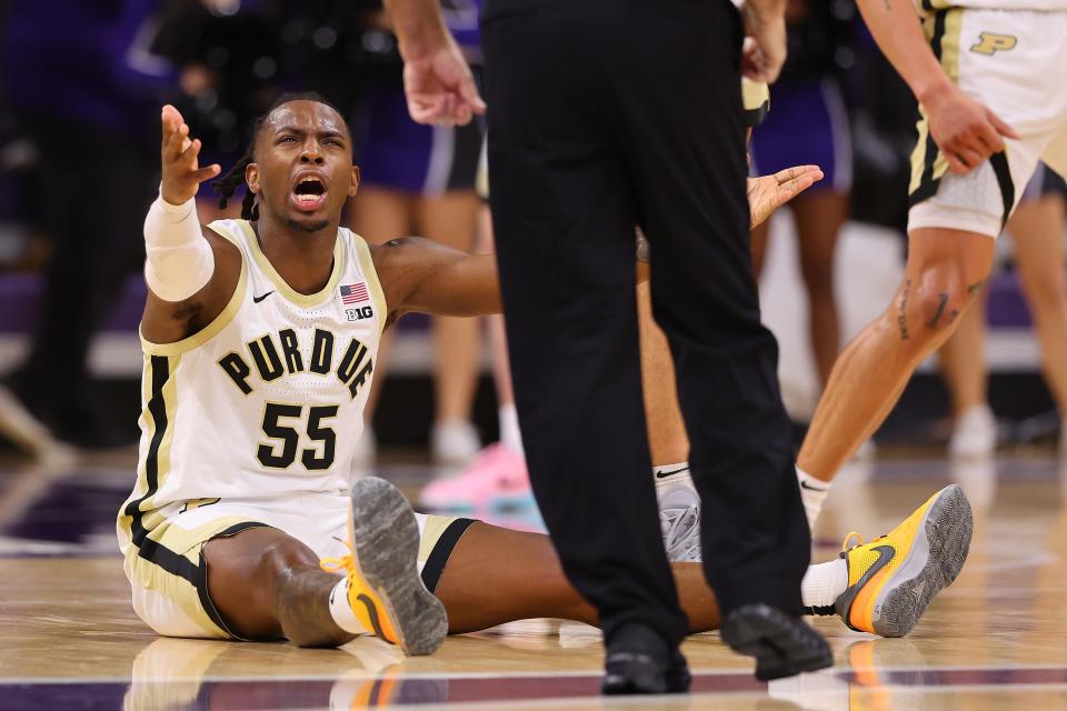 EVANSTON, ILLINOIS - DECEMBER 01: Lance Jones #55 of the Purdue Boilermakers reacts against the Northwestern Wildcats during the second half at Welsh-Ryan Arena on December 01, 2023 in Evanston, Illinois. (Photo by Michael Reaves/Getty Images)