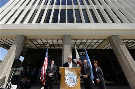 Torrance Mayor Frank Scotto (C) speaks, reacting to an announcement by Toyota Motor Sales U.S.A. that it is relocating its headquarters from Torrance to Texas, during a news conference at Torrance City Hall in Torrance, California April 28, 2014. REUTERS/Kevork Djansezian