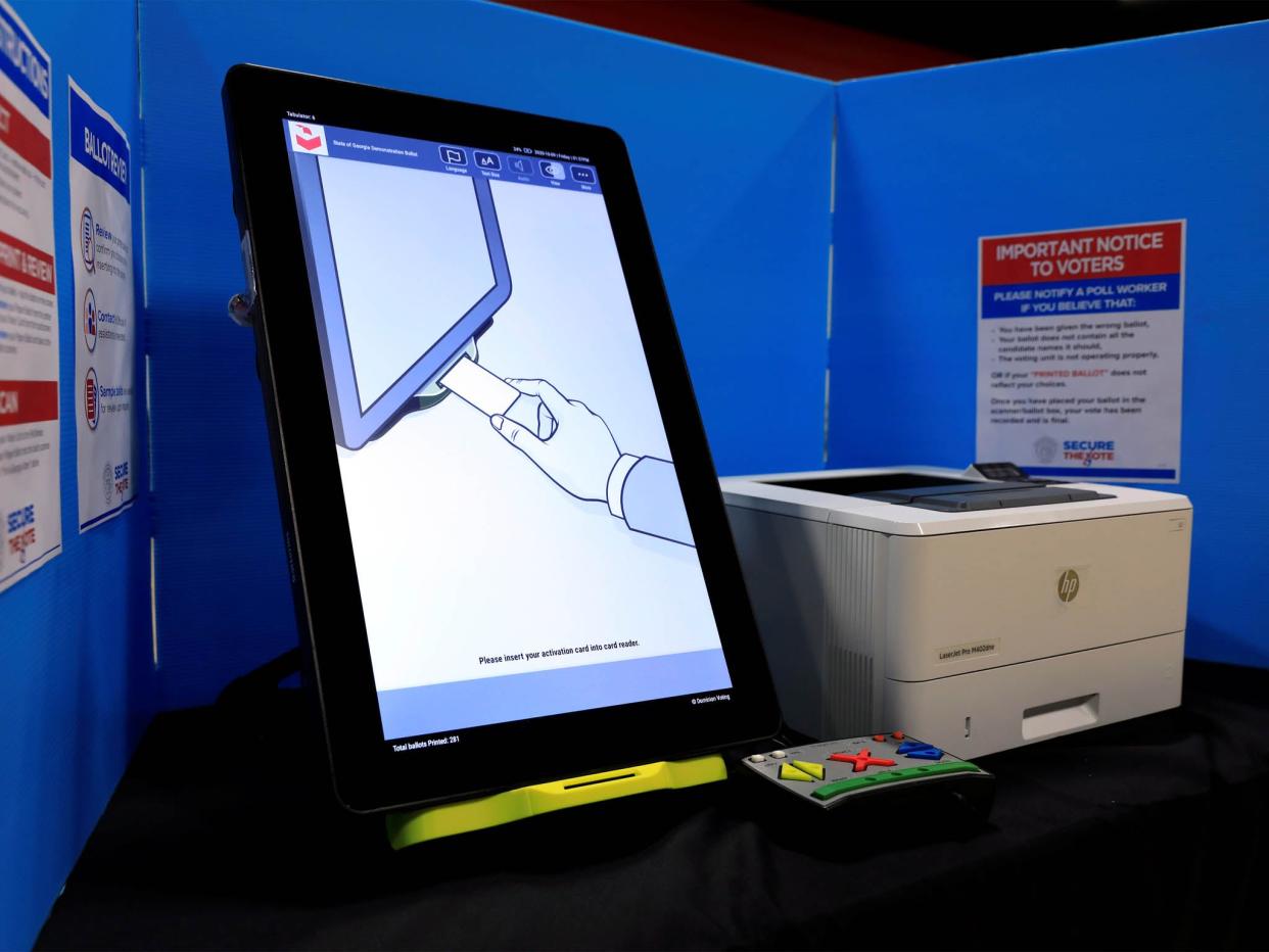 <p>A touch screen voting machine on display in Georgia</p> (Reuters)