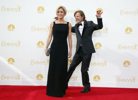 William H. Macy from the Showtime series "Shameless" and his wife, Felicity Huffman. REUTERS/Lucy Nicholson