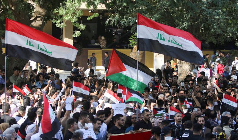 Iraqi students gather during a protest in support of Palestinians in Gaza, in Baghdad