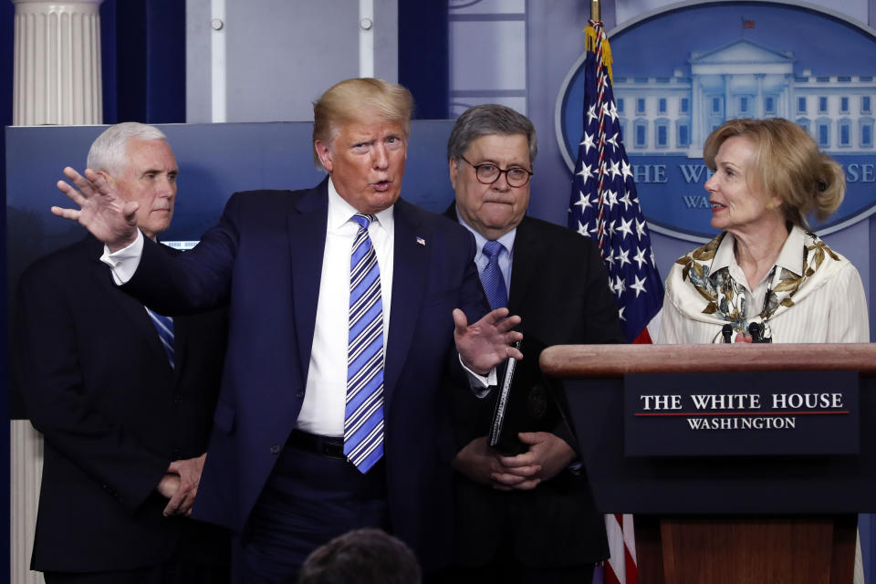 President Donald Trump gestures as he asks a question to Dr. Deborah Birx, White House coronavirus response coordinator, during a briefing about the coronavirus in the James Brady Briefing Room, Monday, March 23, 2020, in Washington. (AP Photo/Alex Brandon)