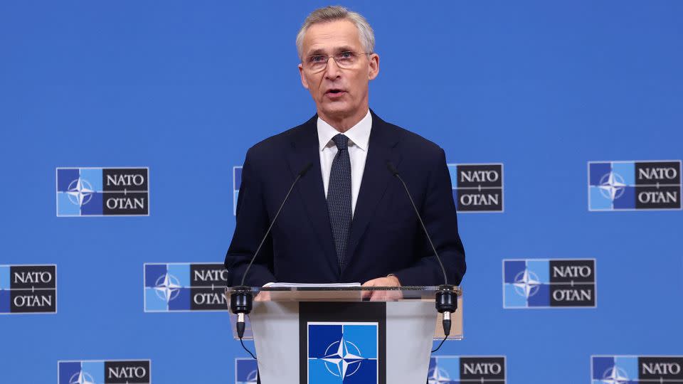 NATO Secretary-General Jens Stoltenberg announces increased spending at a press conference shortly after Trump's comments. - Yves Herman/Reuters