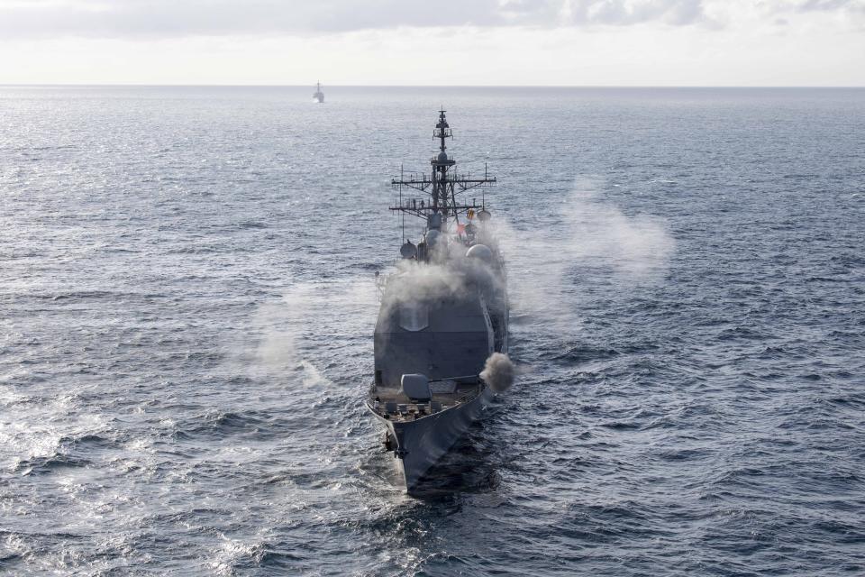 In this photo provided by South Korea Defense Ministry, the USS Robert Smalls cruiser fires during a joint naval exercise between South Korea and the United State in South Korea's East Sea, Monday, Sept. 25, 2023. North Korea on Monday called South Korean President Yoon Suk Yeol 