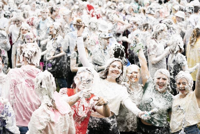 Hundreds of students take part in the traditional Raisin Monday foam fight on St Salvator’s Lower College Lawn at the University of St Andrews in Fife