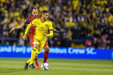 Nov 21, 2017; Columbus, OH, USA; Columbus Crew SC midfielder Artur (7) dribbles the ball while Toronto FC midfielder Victor Vazquez (7) defends in the first half of the game in the first leg of the MLS Eastern Conference Championship at MAPFRE Stadium. Trevor Ruszkowski-USA TODAY Sports