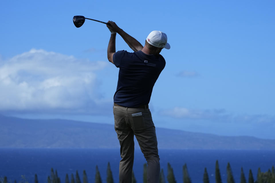 Chris Kirk hits from the 18th tee during the third round of The Sentry golf event, Saturday, Jan. 6, 2024, at Kapalua Plantation Course in Kapalua, Hawaii. (AP Photo/Matt York)