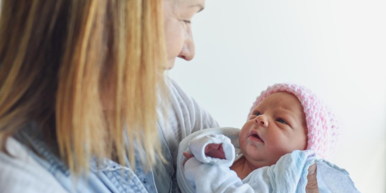 grandma holding newborn baby grandma showers