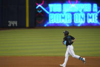 Miami Marlins' Adam Duvall rounds second base after hitting a home run during the fourth inning of a baseball game against the Atlanta Braves, Saturday, June 12, 2021, in Miami. (AP Photo/Wilfredo Lee)