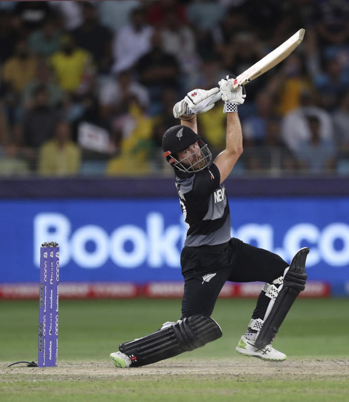 New Zealand's captain Kane Williamson hits a four during the Cricket Twenty20 World Cup final match between Australia and New Zealand in Dubai, UAE, Sunday, Nov. 14, 2021. (AP Photo/Kamran Jebreili)