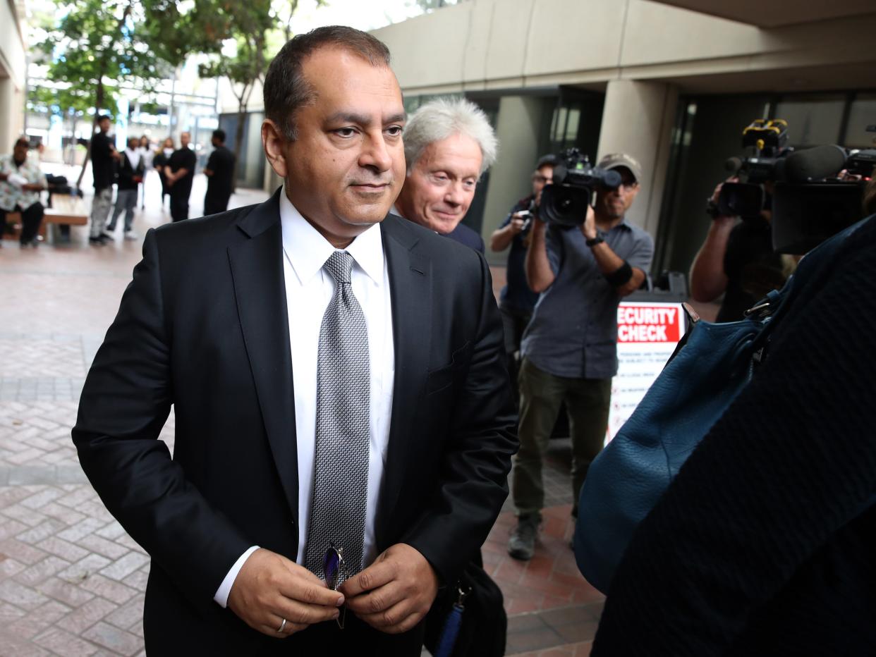 Former Theranos COO Ramesh "Sunny' Balwani walks outside a federal courthouse in San Jose, California