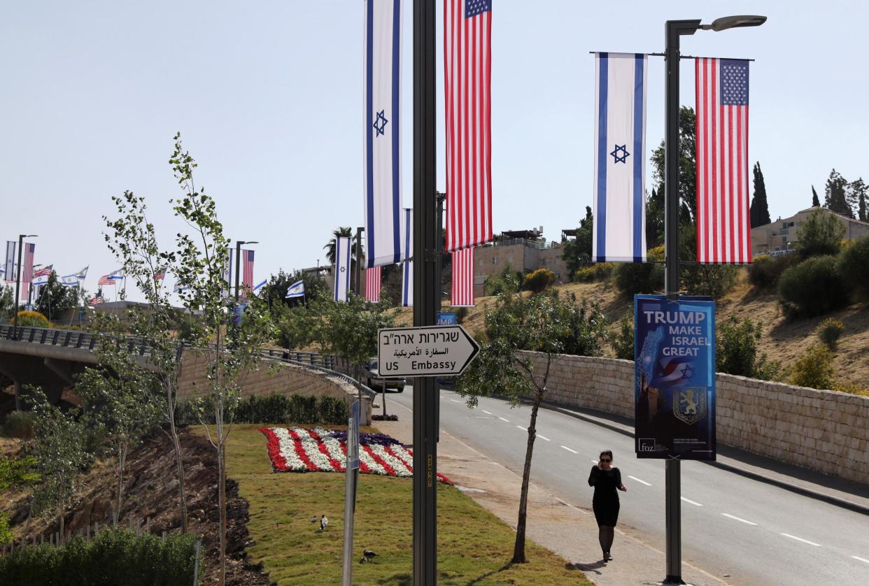 Flags and a floral display in red, white and blue near the new US embassy: Reuters