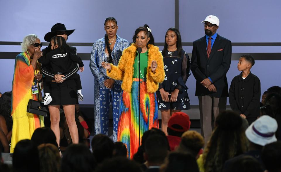 Nipsey Hussle's family and girlfriend Lauren London accept the Humanitarian Award in honor of Nipsey Hussle onstage at the 2019 BET Awards on June 23, 2019, in Los Angeles.
