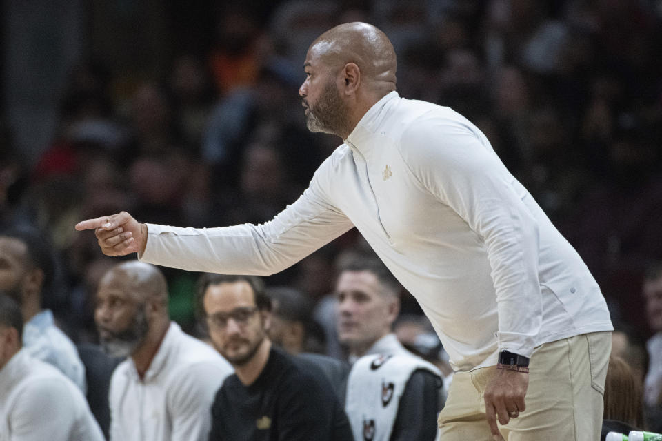 Cleveland Cavaliers head coach J.B. Bickerstaff directs his players against the Phoenix Suns during the second half of an NBA basketball game in Cleveland, Monday, March 11, 2024. (AP Photo/Phil Long)
