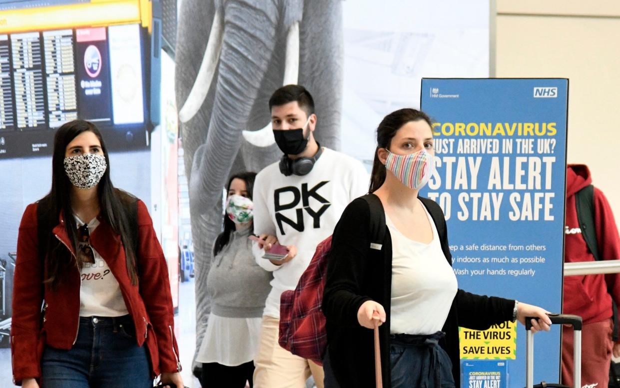 Passengers arriving at Heathrow Airport - David Dyson