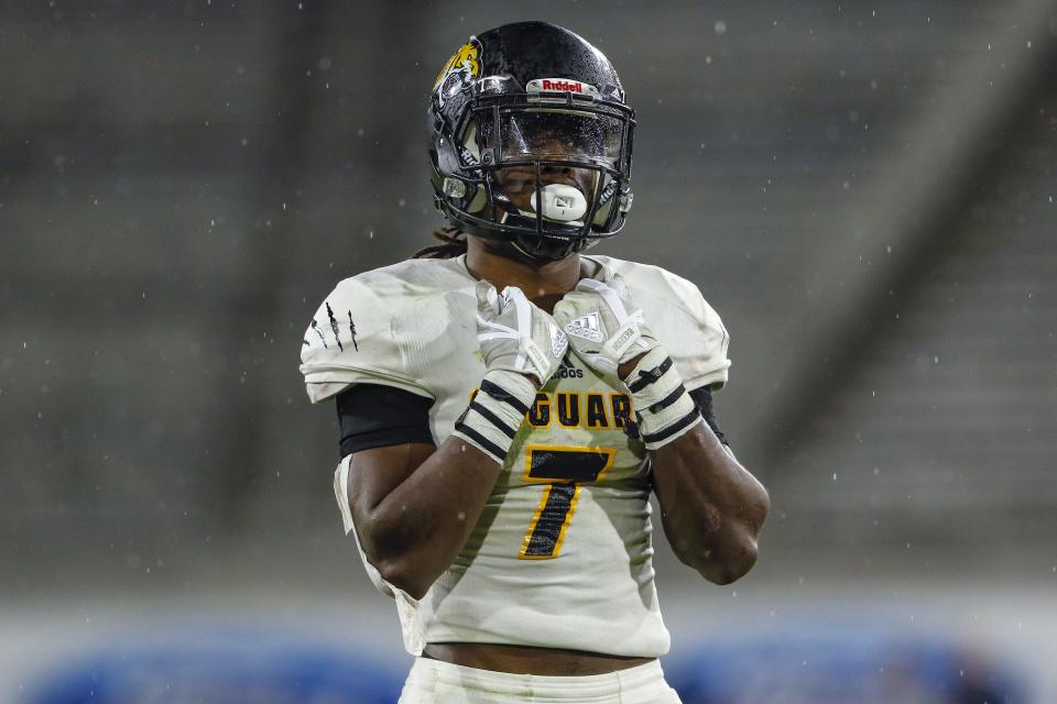 Saguaro cornerback Kelee Ringo holds onto his shoulder pads during the Open Division State Championship on Dec. 7, 2019, in Tempe, AZ.