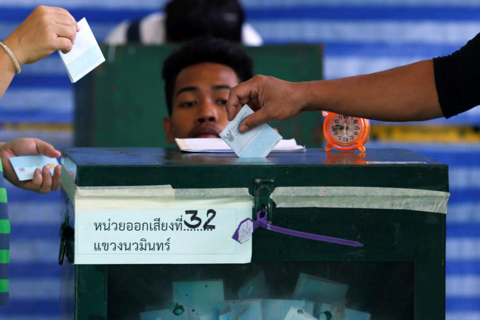 People cast their ballot in Bangkok