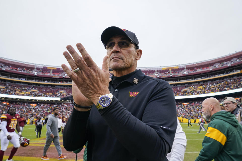 Washington Commanders head coach Ron Rivera applauds as he comes off the field after an NFL football game against the Green Bay Packers, Sunday, Oct. 23, 2022, in Landover, Md. The Commanders won 23-21.(AP Photo/Susan Walsh)