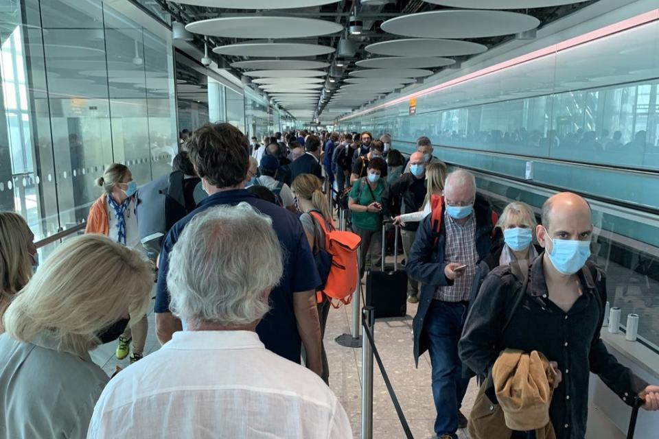 Passengers queueing at Heathrow Airport Terminal 5 (Phil Dean)