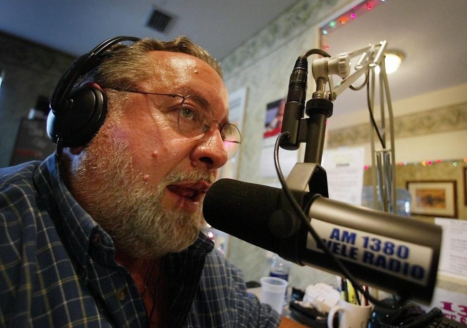 Big John talks with a caller on WELE-AM in Ormond Beach on Dec. 11, 2002. The former county councilman spent the final two decades of his life hosting a daily radio talk show.