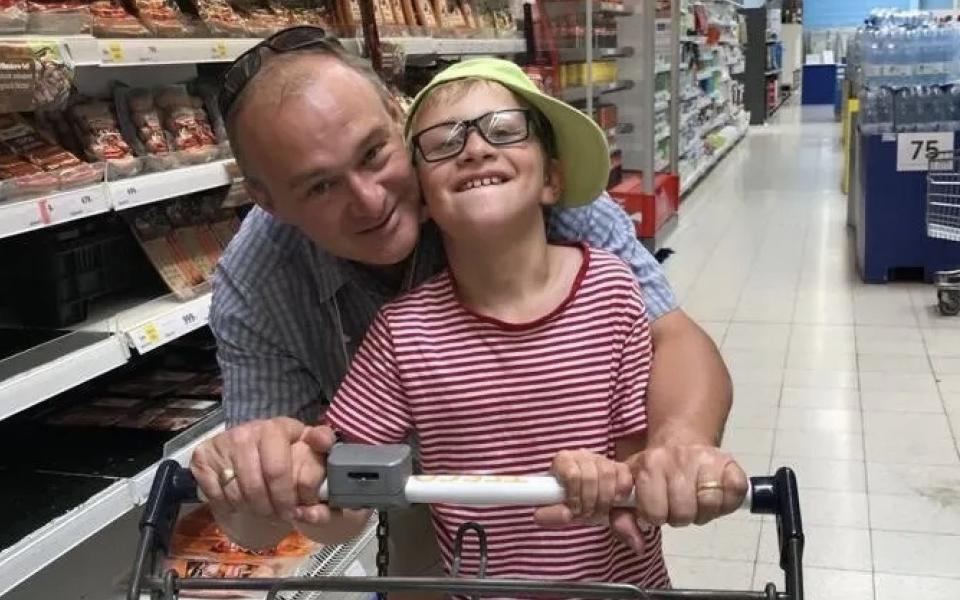 Sir Ed Davey with his son John