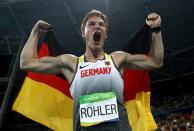 <p>Thomas Rohler of Germany reacts after winning gold in the Men’s Javelin Throw on Day 15 of the Rio 2016 Olympic Games at the Olympic Stadium on August 20, 2016 in Rio de Janeiro, Brazil. (Photo by Alexander Hassenstein/Getty Images) </p>