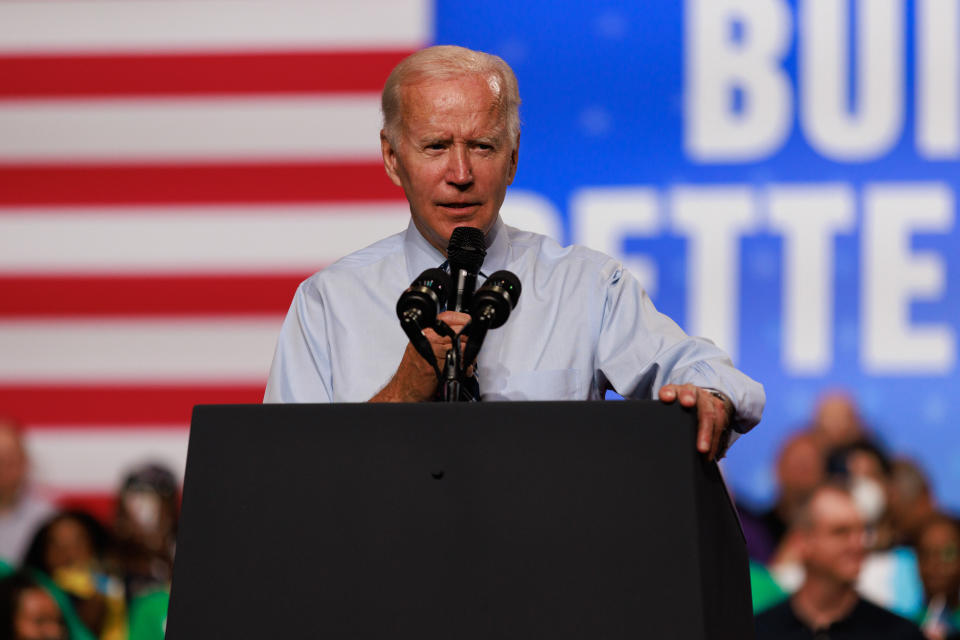 President Biden stands at a podium.