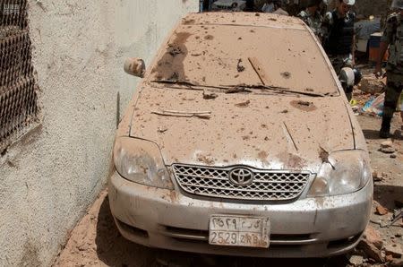 A damaged car is seen after a suicide bomber blew himself up in Mecca, Saudi Arabia June 23, 2017. Picture taken June 23, 2017. Saudi News Agency/Handout via REUTERS