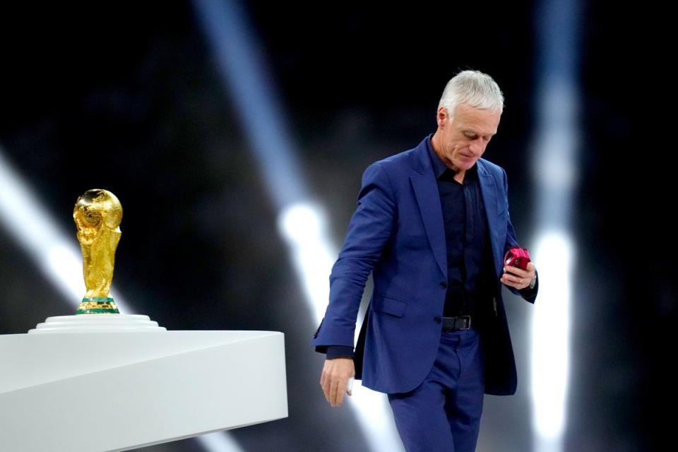 France manager Didier Deschamps walks past the World Cup trophy (Nick Potts/PA) (PA Wire)