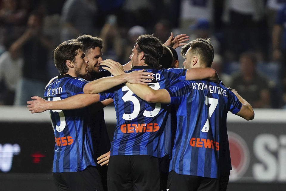 Atalanta's players after Charles De Ketelaere scored during the Serie A soccer match between Atalanta and Roma at the Gewiss Stadium in Bergamo, Italy, Sunday, May 12, 2024. (Spada/LaPresse via AP)