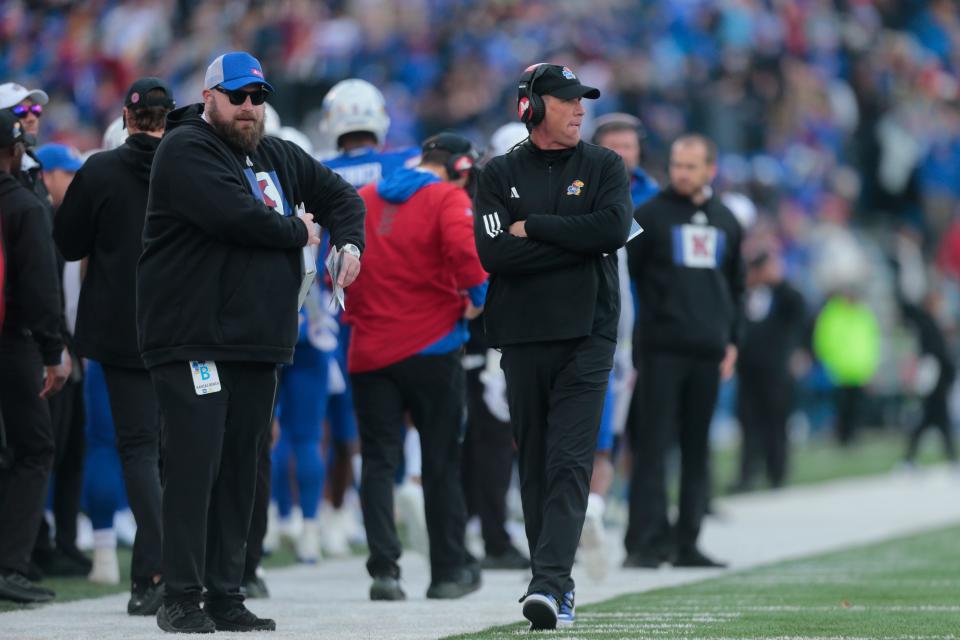 Kansas football coach Lance Leipold walks the sidelines during the second quarter of a game against Oklahoma earlier this year inside David Booth Kansas Memorial Stadium.