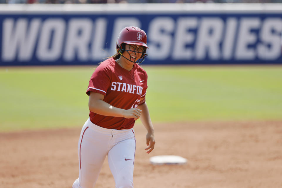 Stanford's Kylie Chung runs the bases after hitting a home run against Oklahoma during the first inning of an NCAA softball Women's College World Series game Monday, June 5, 2023, in Oklahoma City. (AP Photo/Nate Billings)