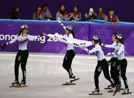 Short Track Speed Skating Events - Pyeongchang 2018 Winter Olympics - Women's 3000 m Final - Gangneung Ice Arena - Gangneung, South Korea - February 20, 2018 - Shim Sukhee, Minjeong Choi, Kim Alang and Kim Yejin of South Korea celebrate. REUTERS/Phil Noble