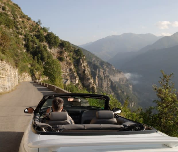 Winding between sea and alps, the Grand Corniche is one of Europe's most magnificent, wheel-clutching drives.<p>Stephan Hoerold</p>