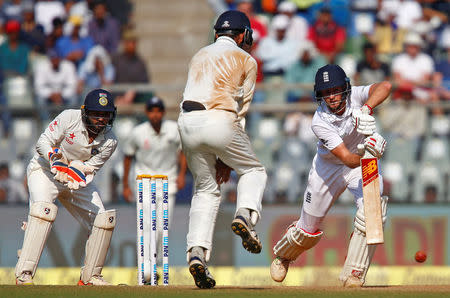 Cricket - India v England - Fourth Test cricket match - Wankhede Stadium, Mumbai, India - 11/12/16. England's Joe Root plays a shot. REUTERS/Danish Siddiqui